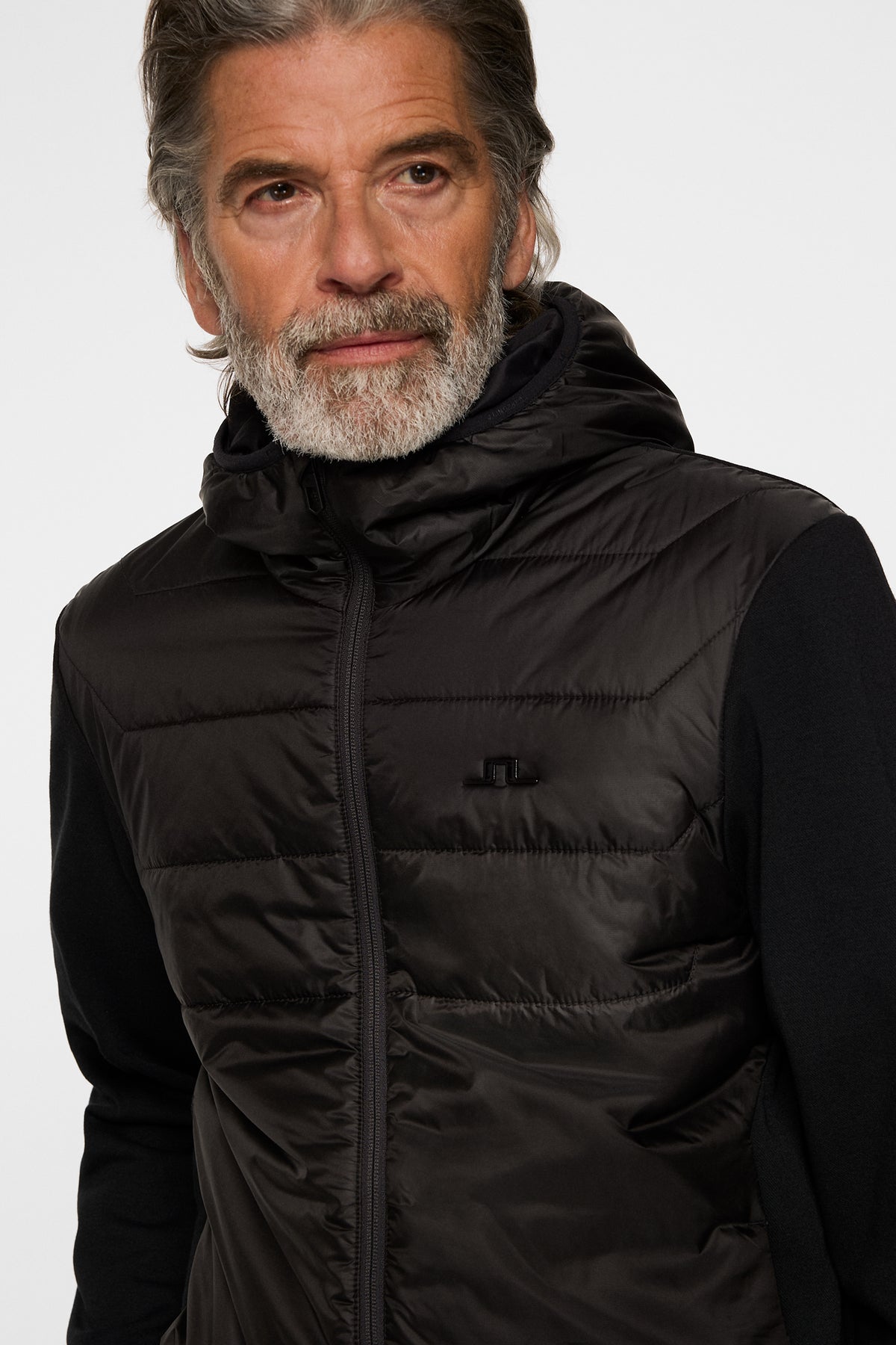 Gregory Hybrid Hood in Black by J.Lindeberg