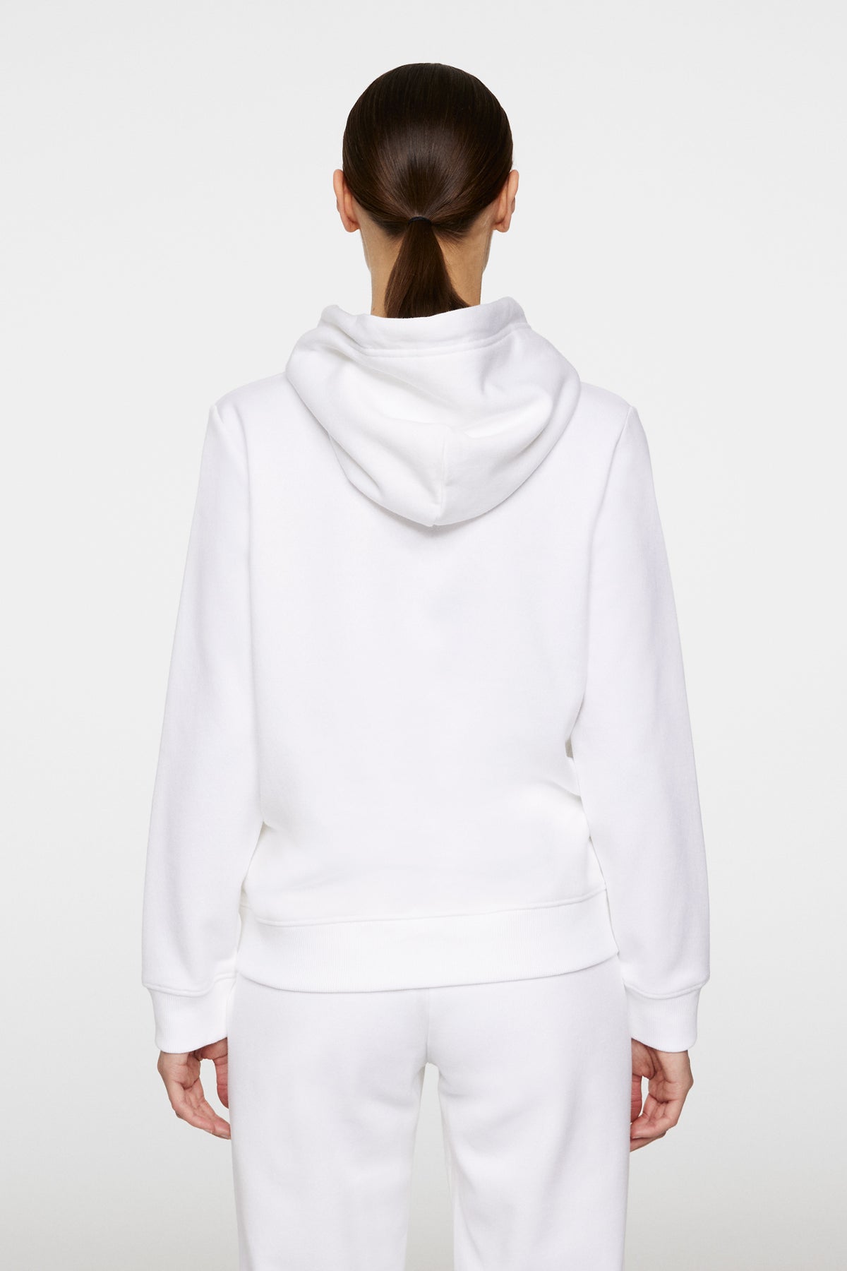 W Alpha Hood in White by J.Lindeberg
