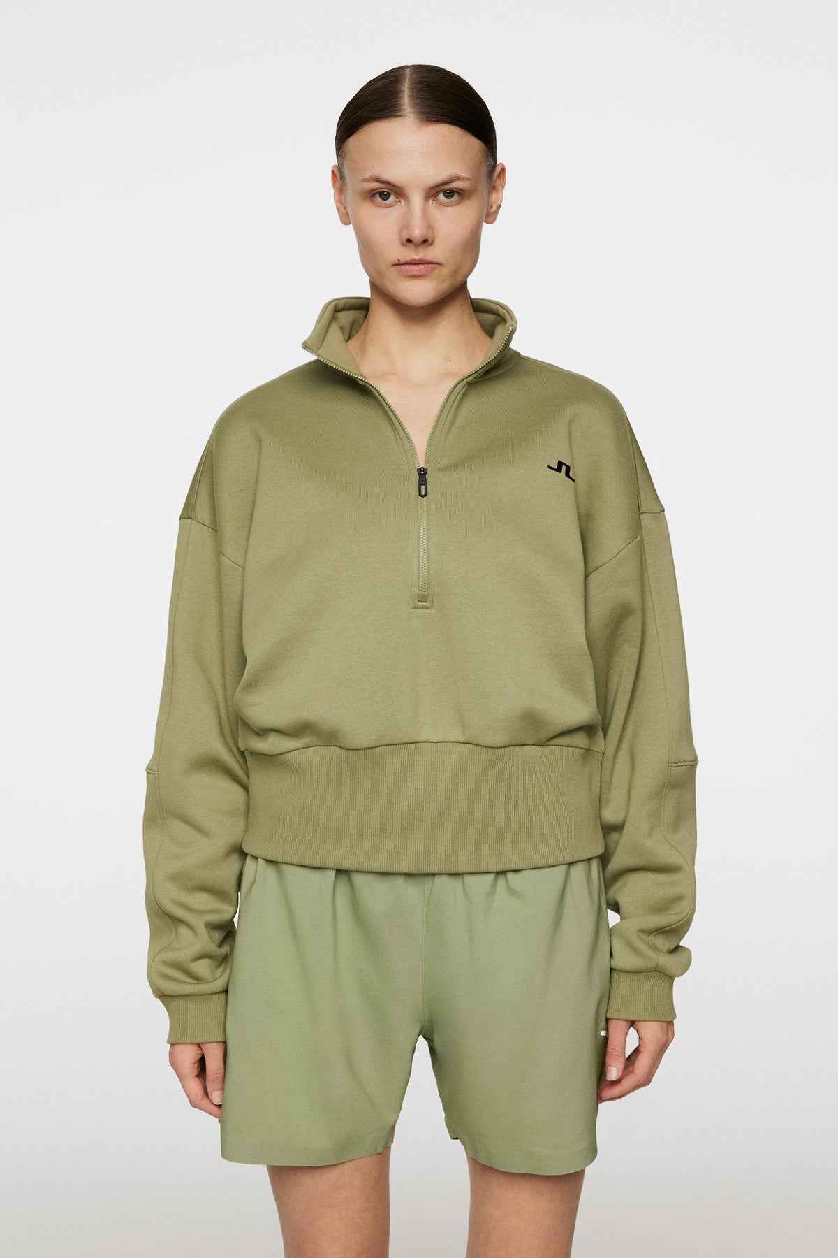 Lucia Zip Mock Neck in Oil Green by J.Lindeberg