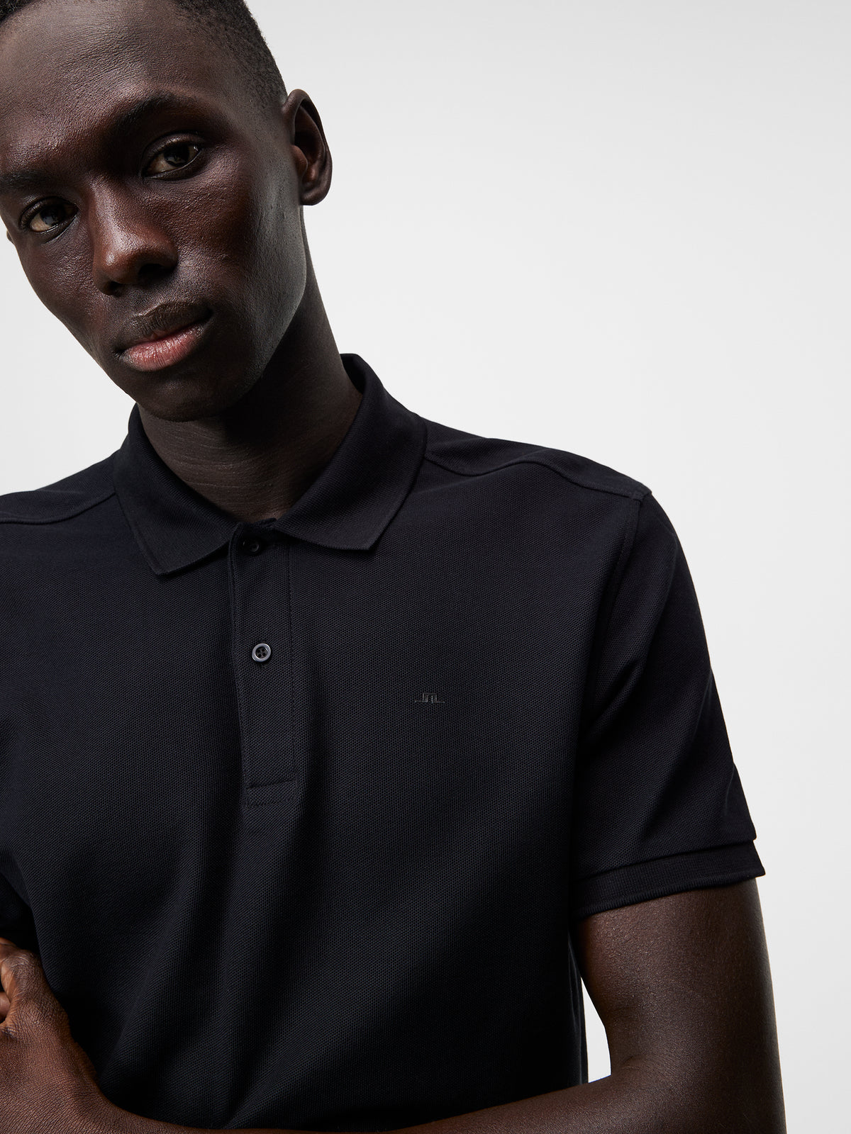 Troy Pique Polo Shirt in Black by J.Lindeberg