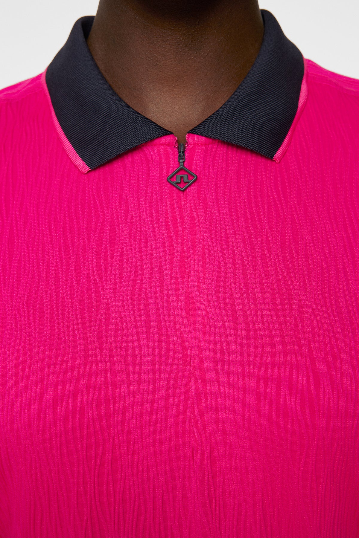 Izara Polo in Pink Peacock by J.Lindeberg