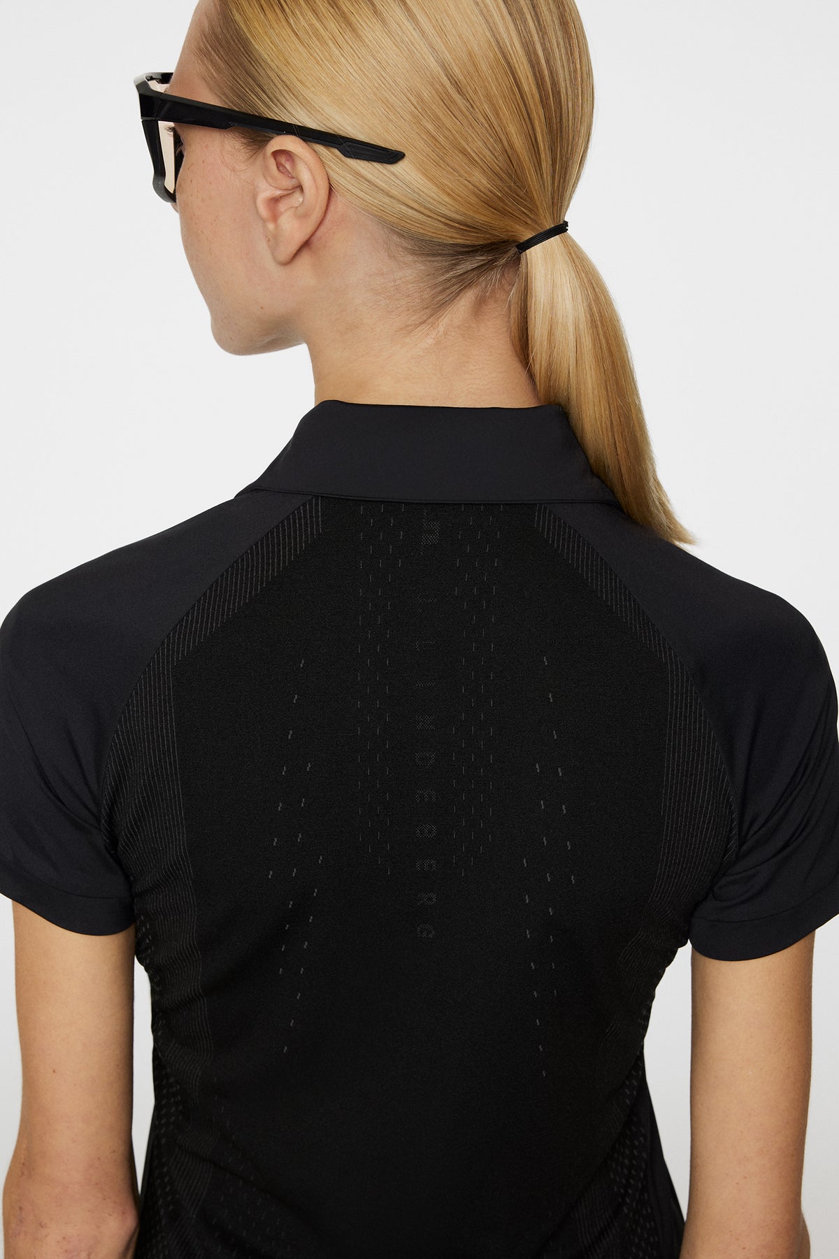 Bobi Tech Polo in Black by J.Lindeberg
