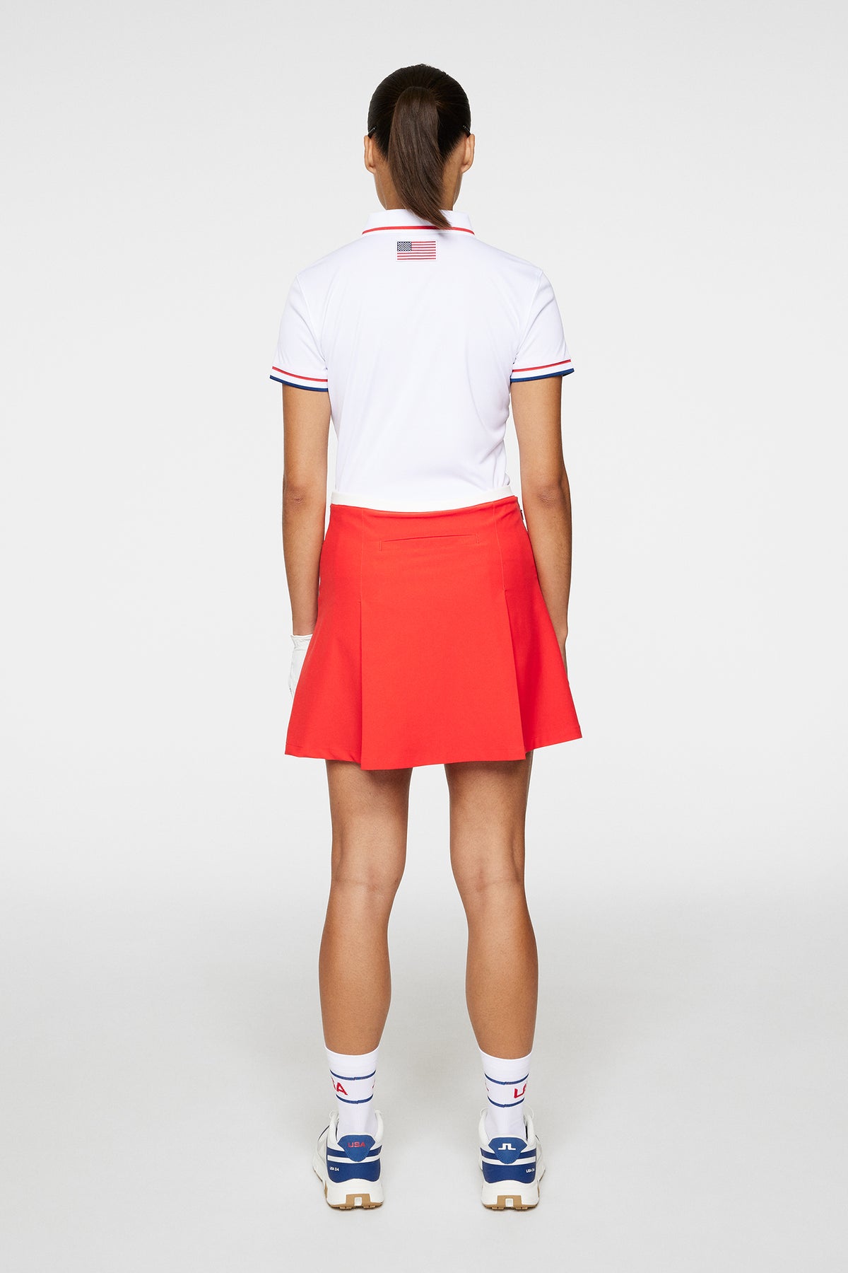 Elle Pleated Skirt in Flame Scarlet by J.Lindeberg