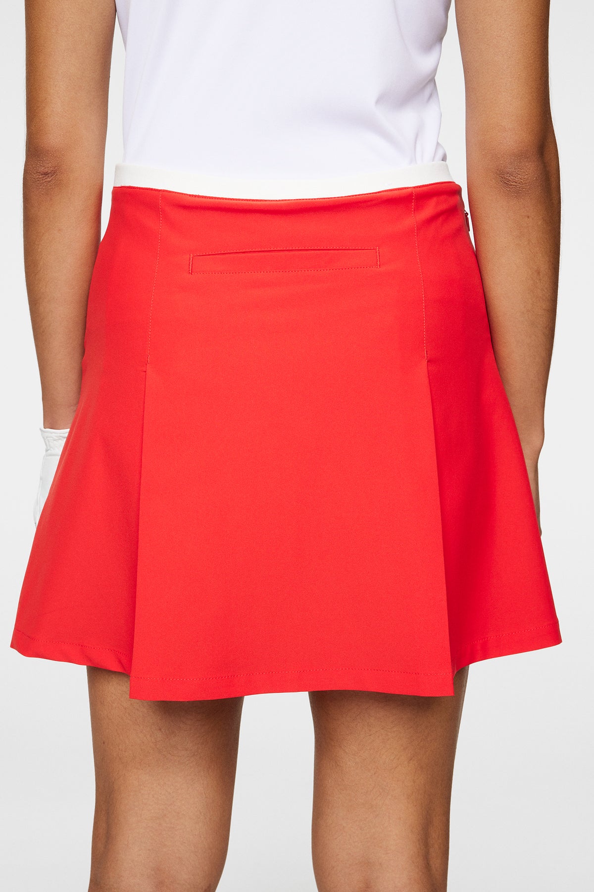 Elle Pleated Skirt in Flame Scarlet by J.Lindeberg