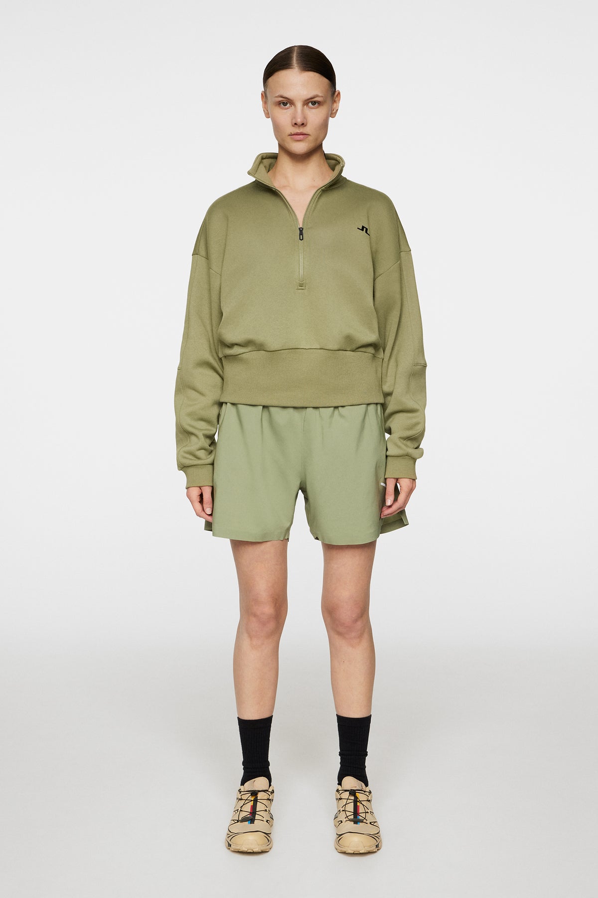 Lucia Zip Mock Neck in Oil Green by J.Lindeberg