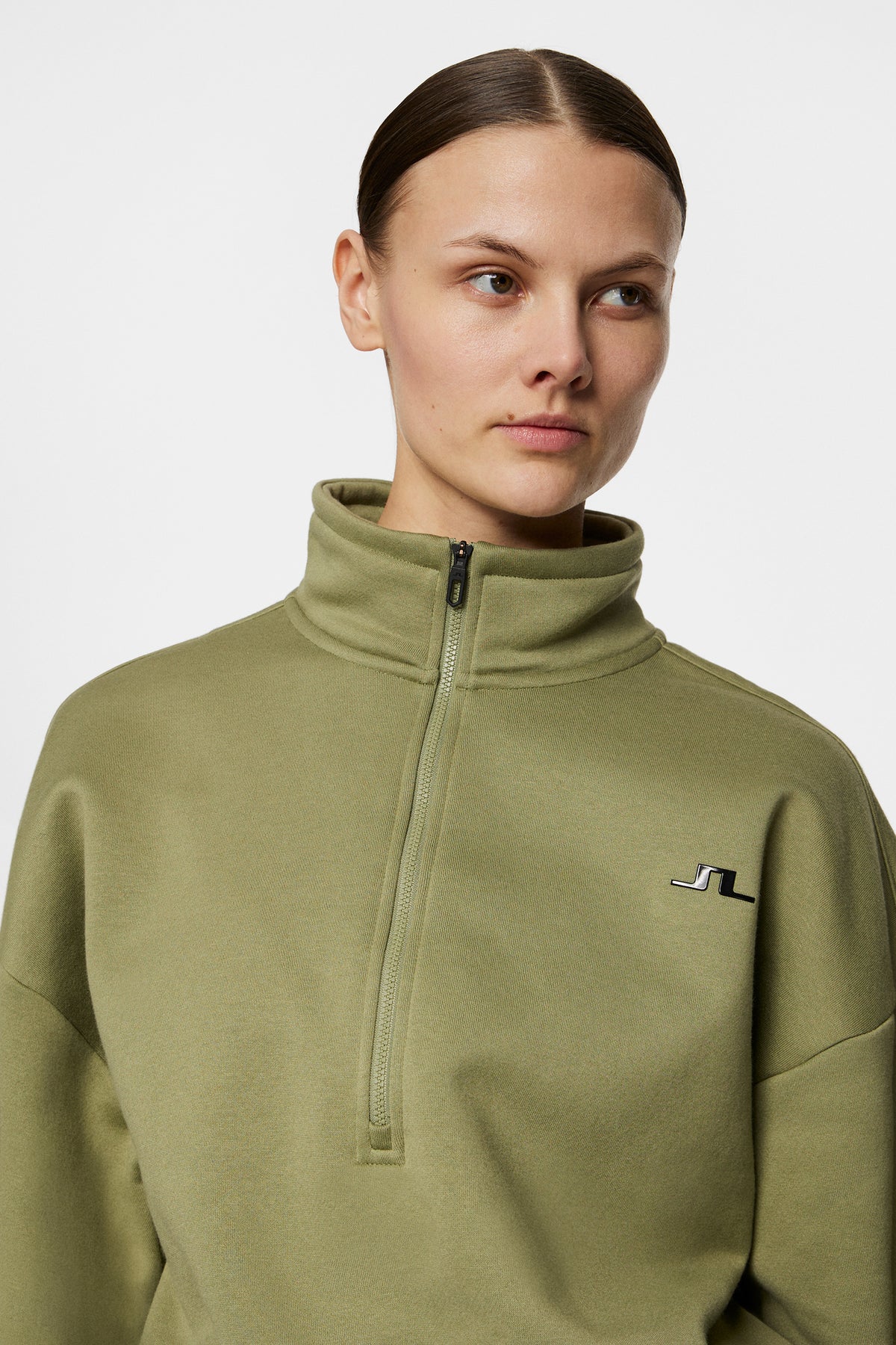 Lucia Zip Mock Neck in Oil Green by J.Lindeberg