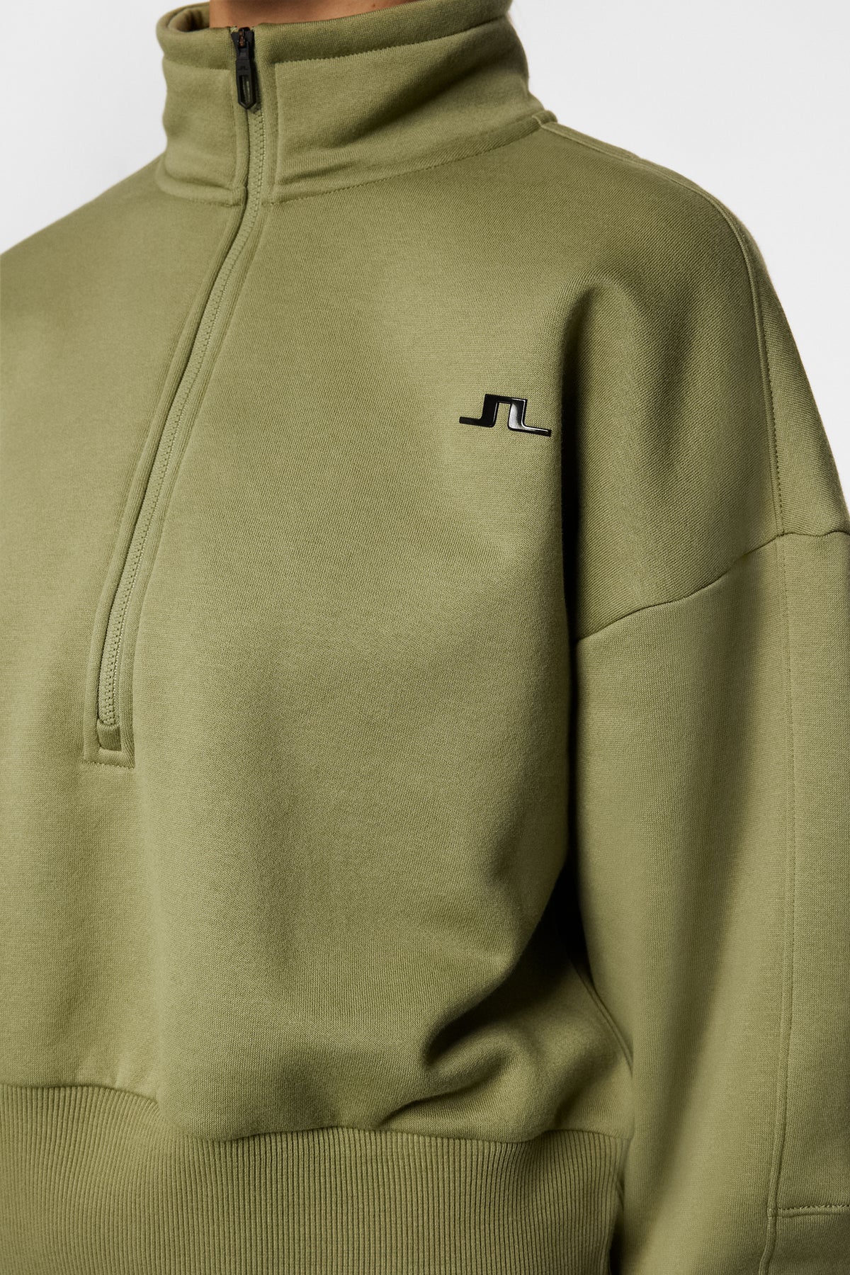 Lucia Zip Mock Neck in Oil Green by J.Lindeberg