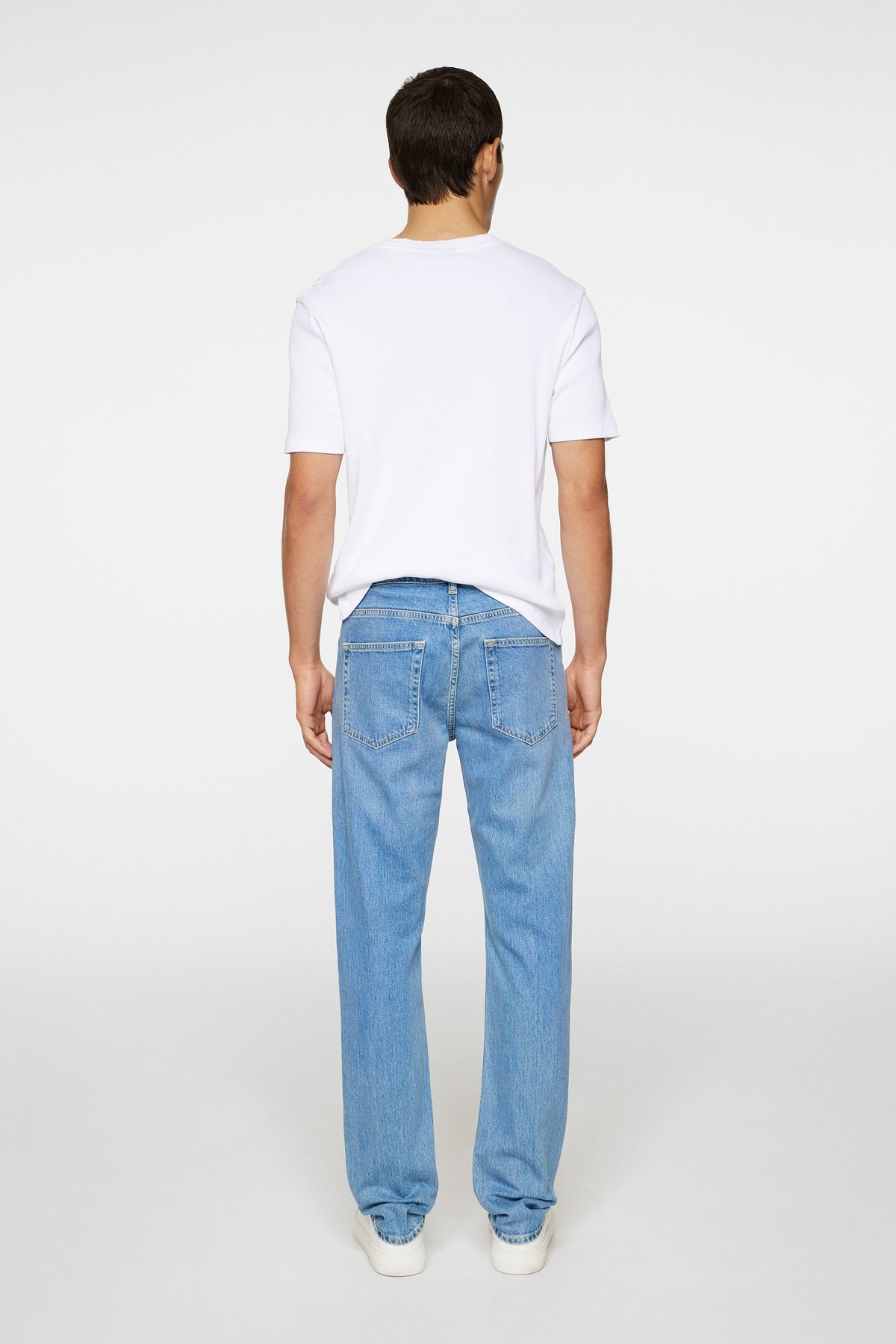 Jax Light Wash Slim Jeans in Light Blue by J.Lindeberg