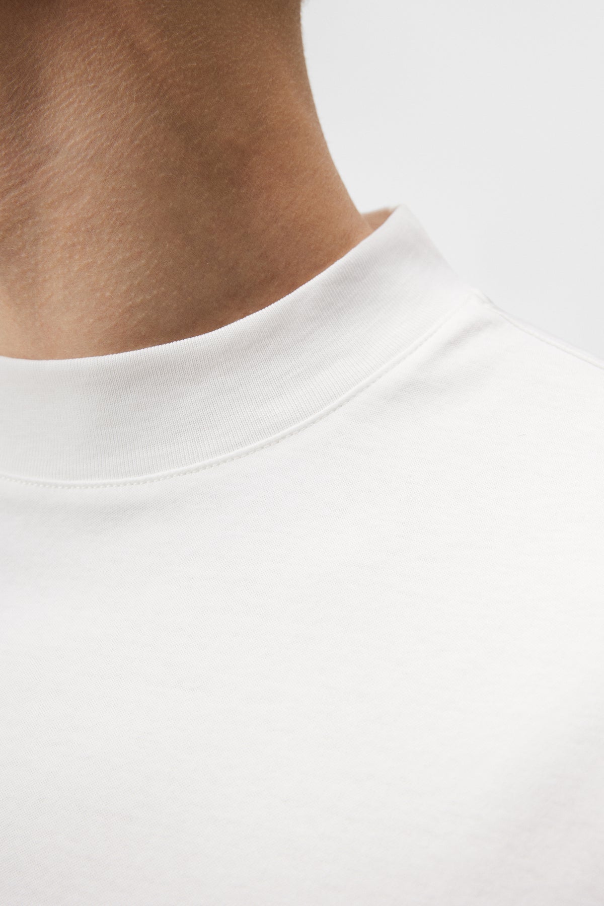 Ace Mock Neck T-shirt in White by J.Lindeberg
