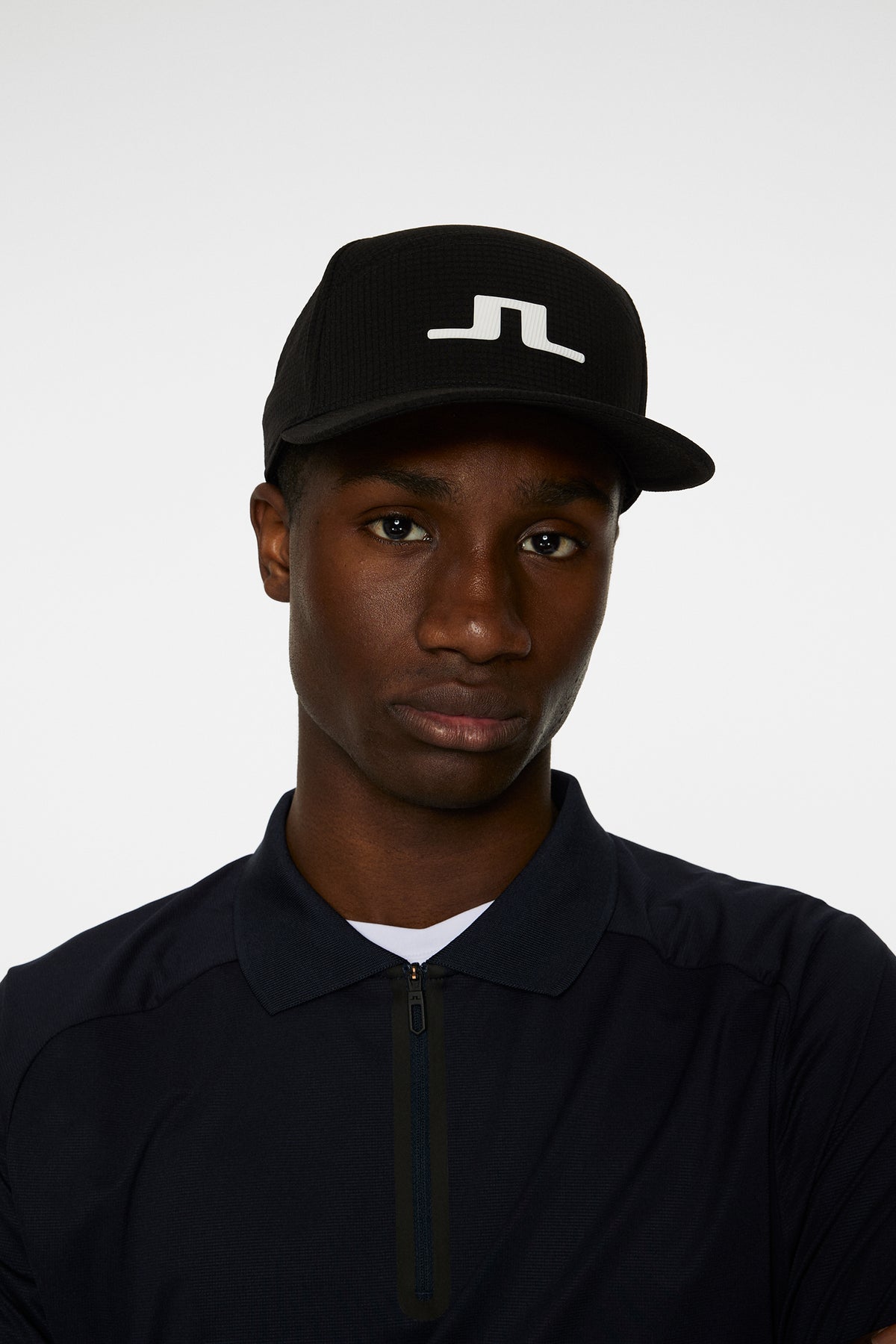 Split cap in Black by J.Lindeberg