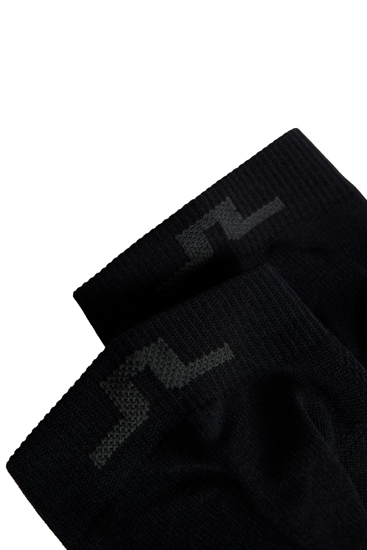 Rise Short Sock in Black by J.Lindeberg