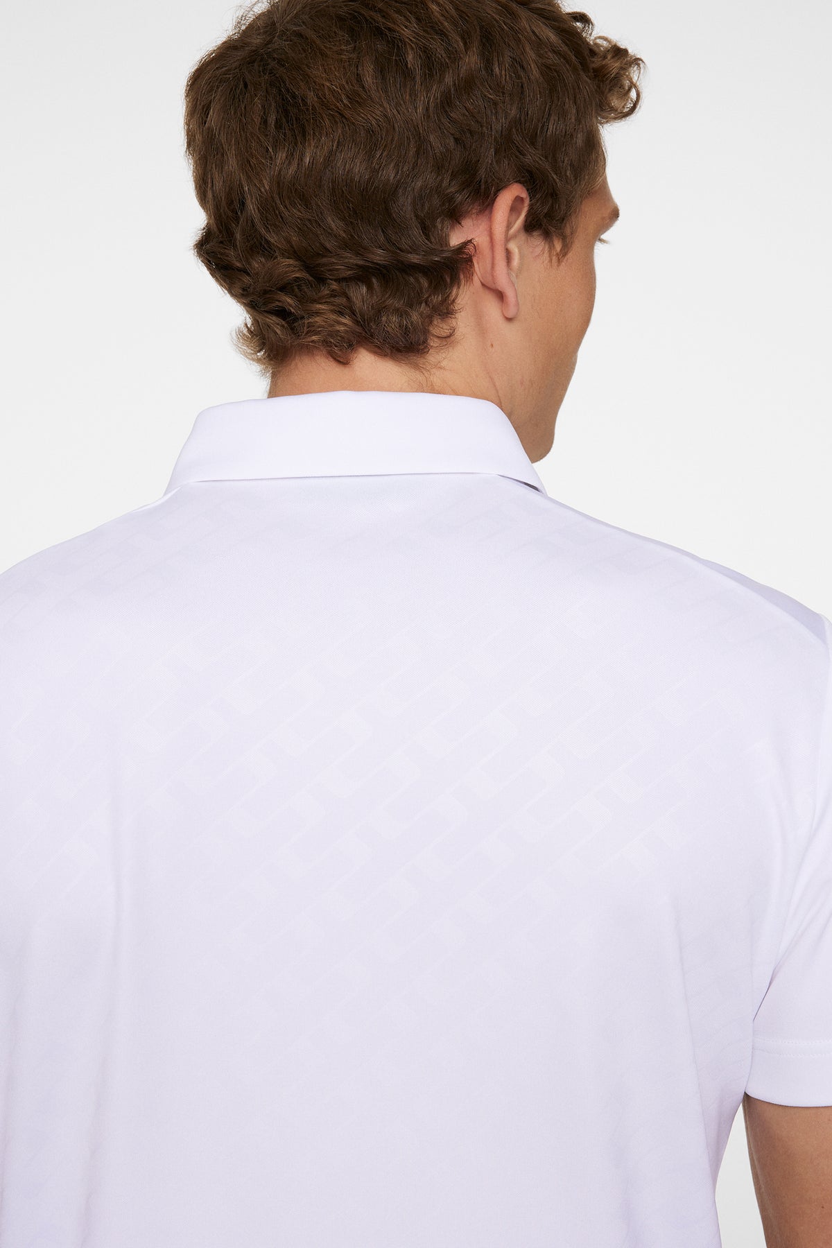 Peat Polo in White by J.Lindeberg