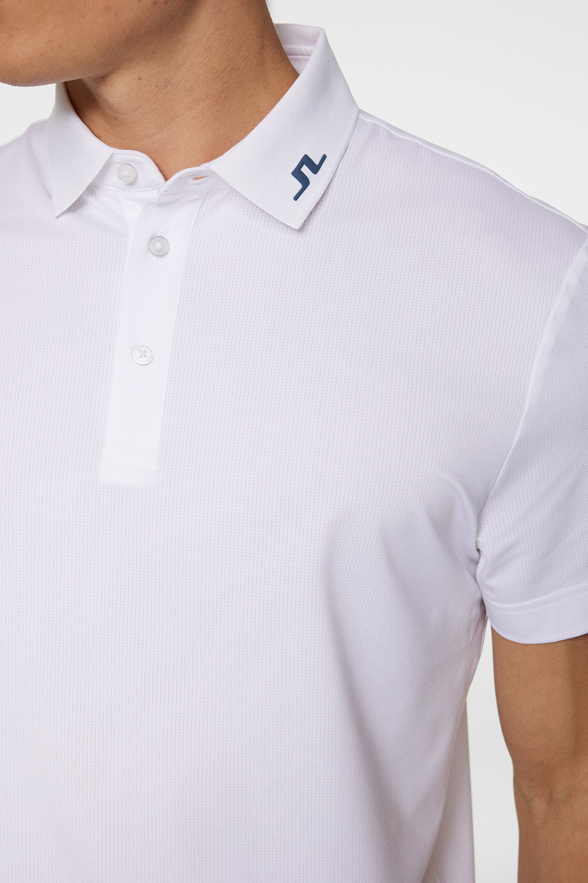 Heath Strike Polo in White by J.Lindeberg