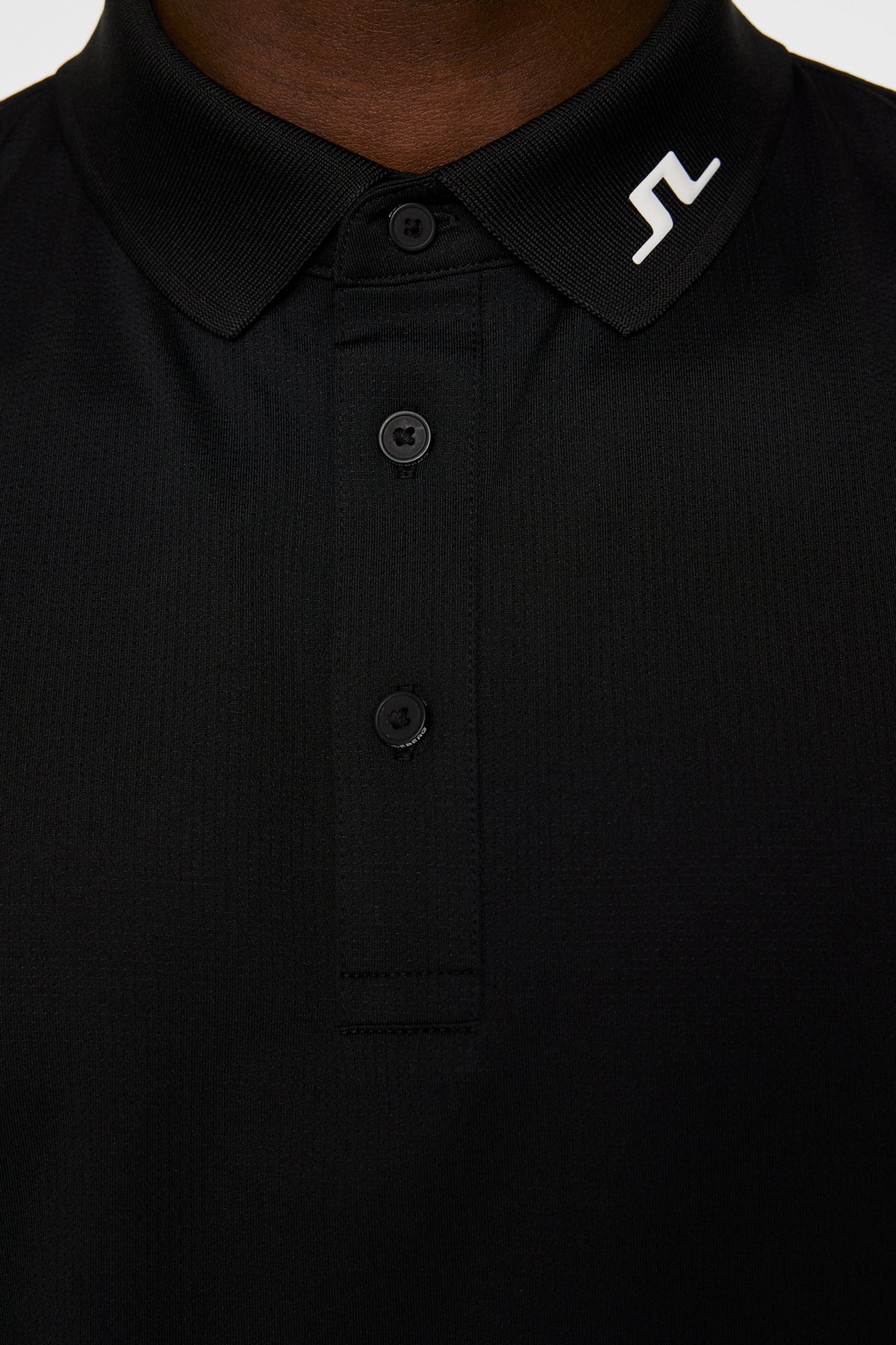 Heath Strike Polo in Black by J.Lindeberg