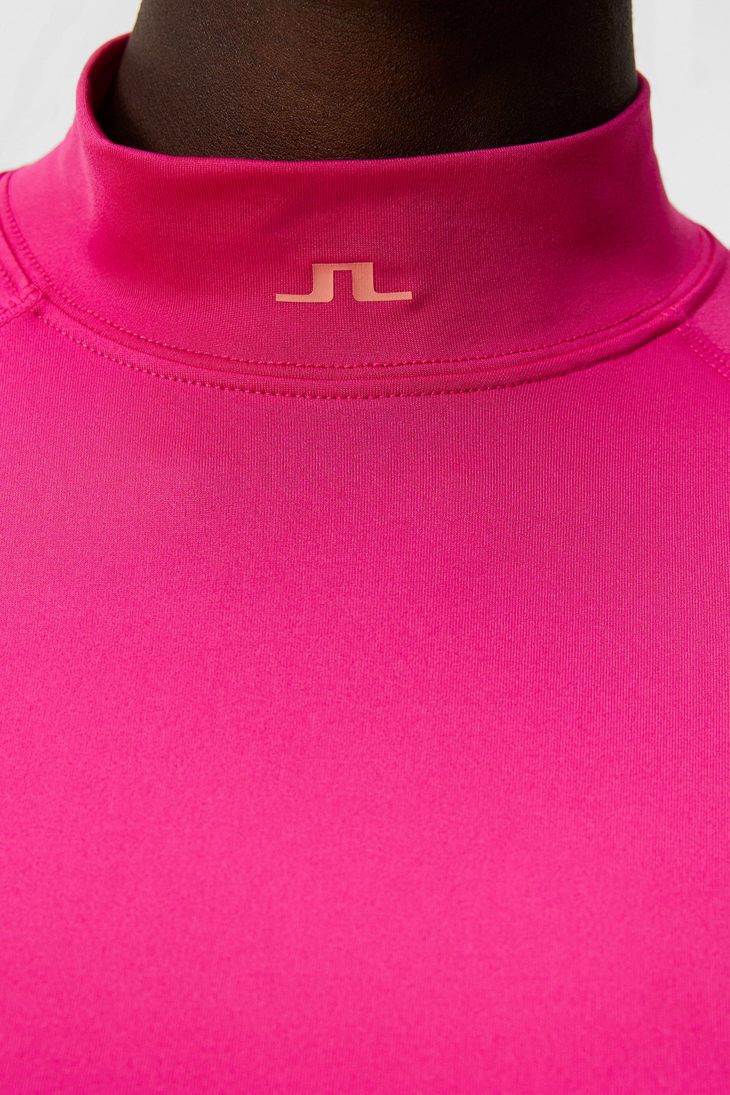 Asa Soft Compression Top in Fuchsia Purple by J.Lindeberg