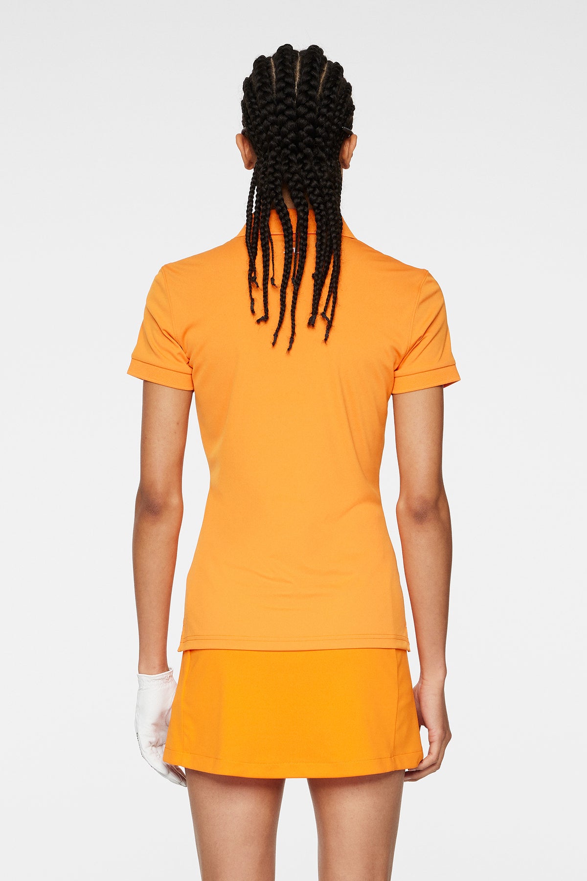 Tour Tech Polo in Persimmon Orange by J.Lindeberg