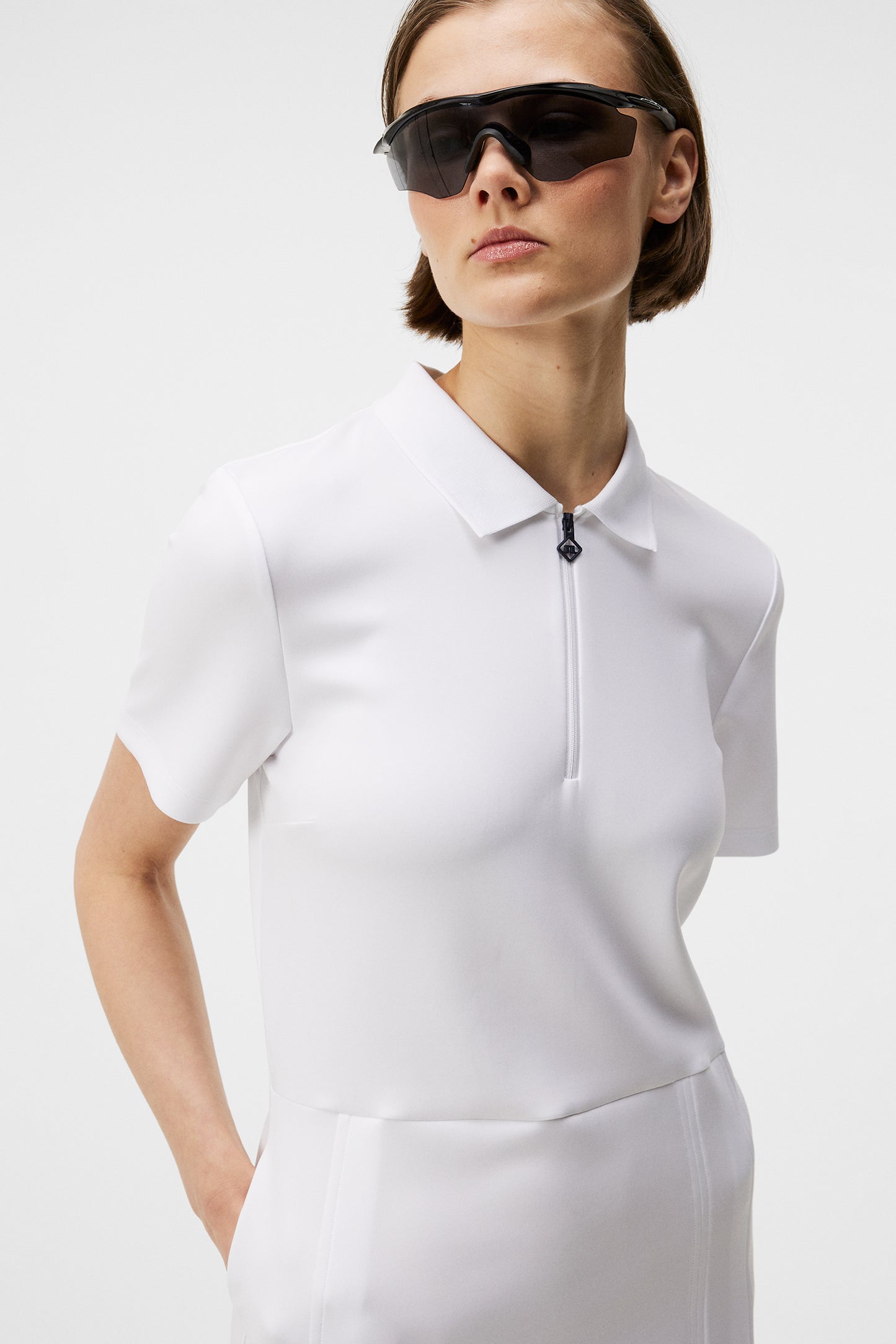 Kanai dress in White by J.Lindeberg