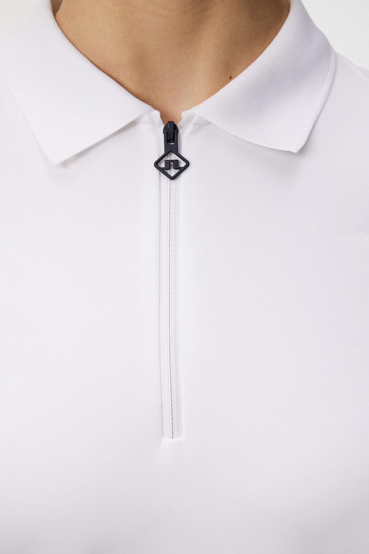 Kanai dress in White by J.Lindeberg